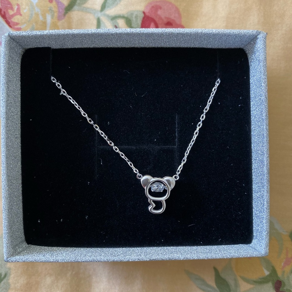 Silver Koala necklace with stone inside